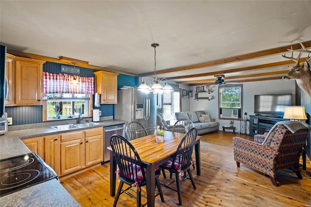 dining area featuring ceiling fan with notable chandelier, cooling unit, sink, light hardwood / wood-style flooring, and beamed ceiling