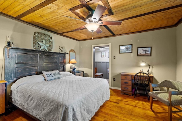 bedroom featuring crown molding, ceiling fan, hardwood / wood-style floors, and wood ceiling