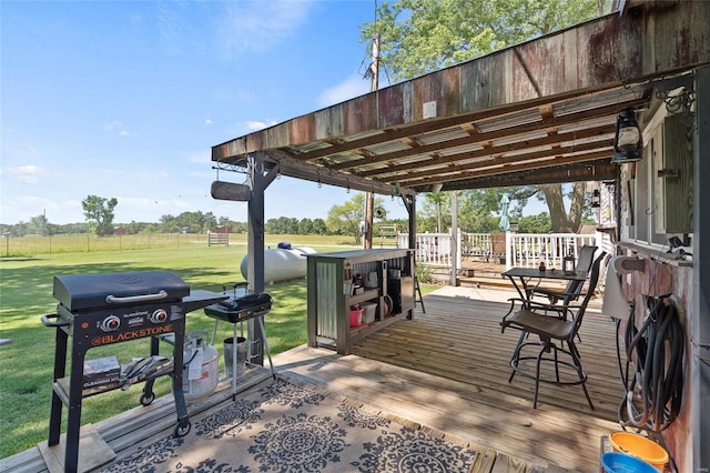 wooden terrace with area for grilling