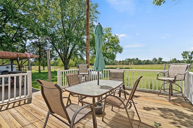 deck featuring a lawn