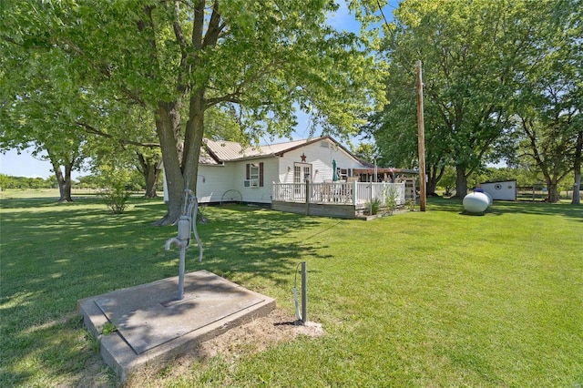 view of yard featuring a deck