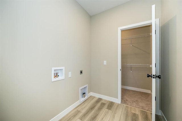 laundry room featuring washer hookup, light hardwood / wood-style floors, and electric dryer hookup