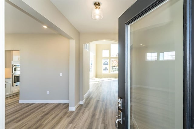 hallway featuring light hardwood / wood-style floors