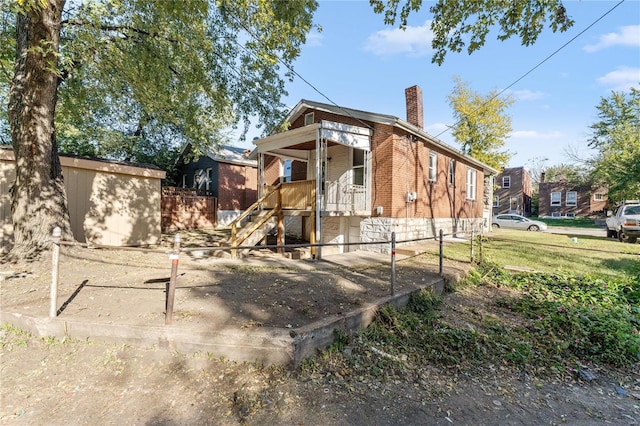 exterior space with a front lawn