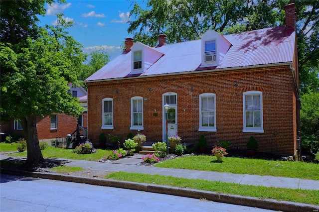 view of front of house with a front lawn