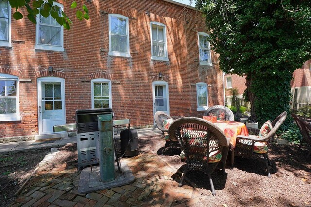 rear view of property with a patio