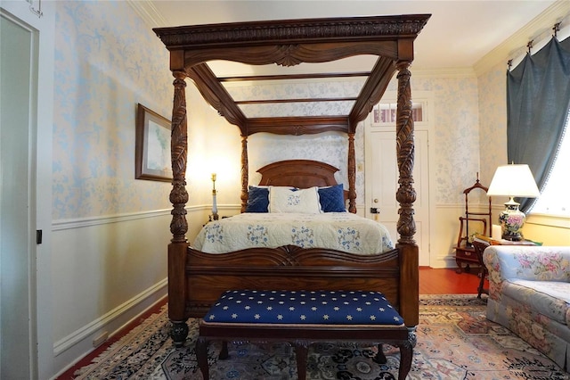 bedroom with hardwood / wood-style flooring and ornamental molding