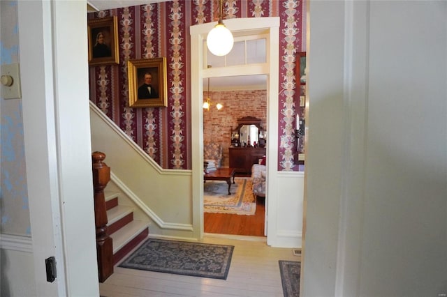 foyer entrance featuring light wood-type flooring