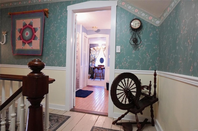 hallway with light hardwood / wood-style flooring