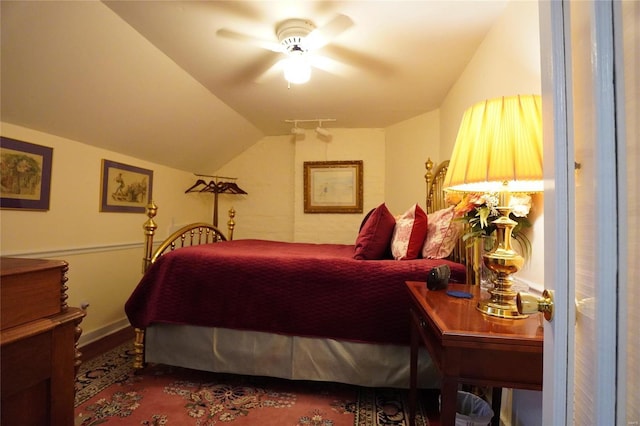 bedroom featuring vaulted ceiling and ceiling fan