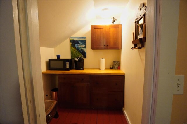 bathroom with vaulted ceiling