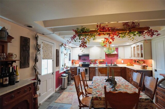 dining space with sink