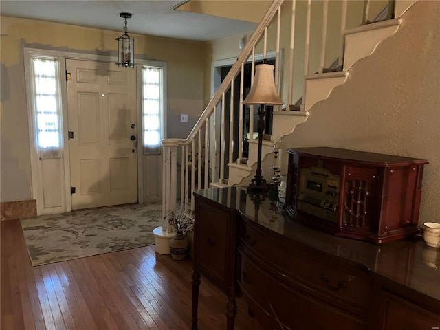 entrance foyer featuring hardwood / wood-style flooring