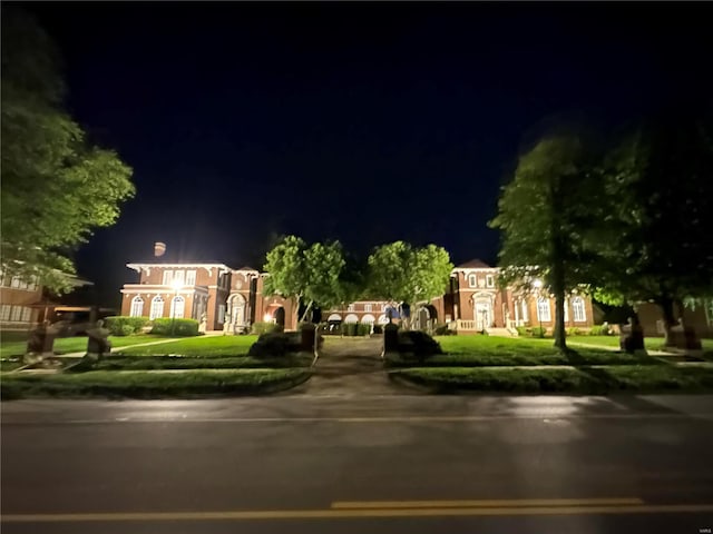 view of front of home with a yard