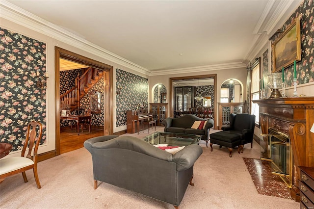 living room with carpet and crown molding