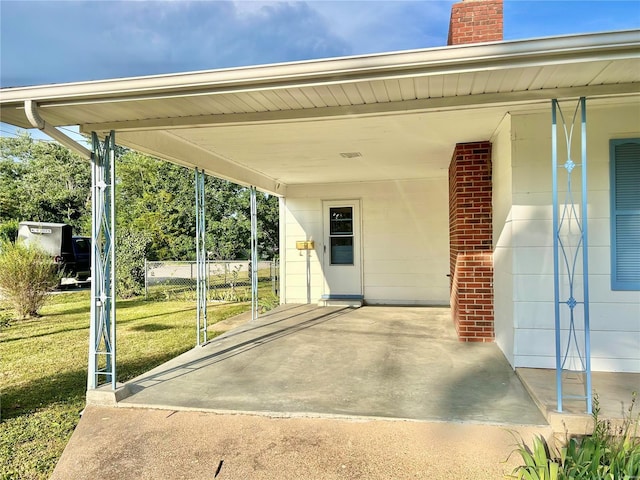 view of patio / terrace featuring a carport