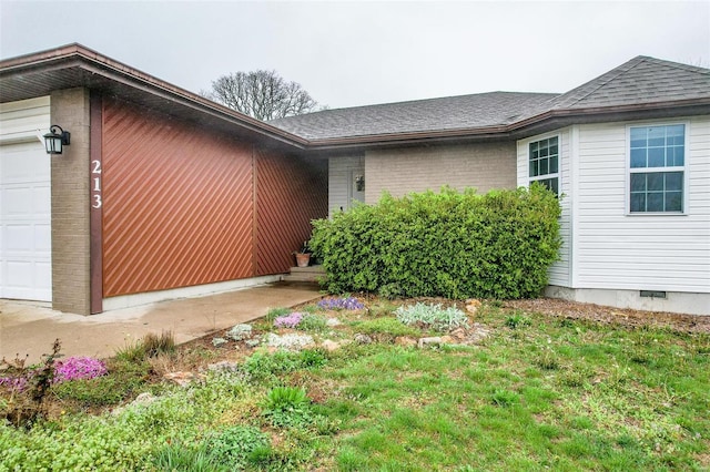 view of home's exterior with a garage