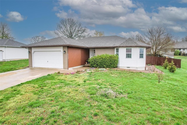 ranch-style home with a garage and a front lawn