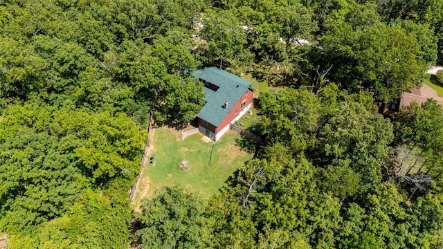 drone / aerial view with a view of trees