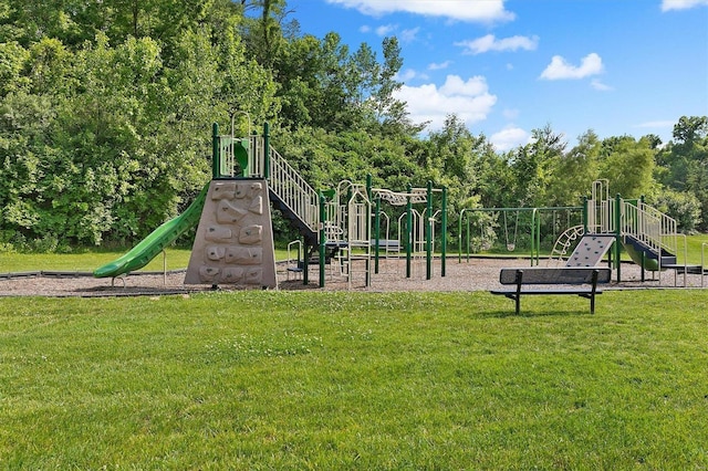 view of jungle gym with a lawn