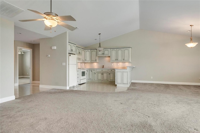 unfurnished living room featuring ceiling fan, light colored carpet, and vaulted ceiling