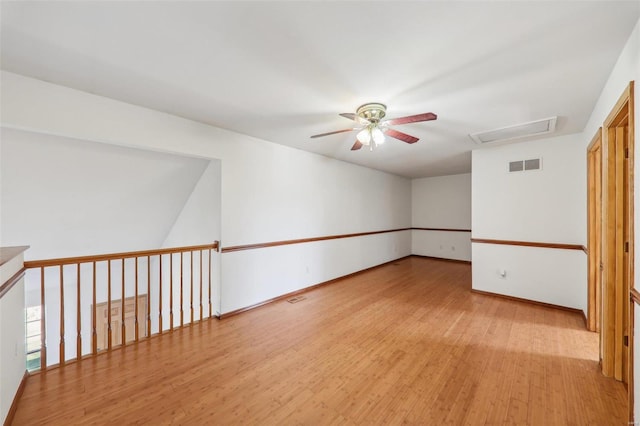 unfurnished room featuring ceiling fan and light hardwood / wood-style flooring