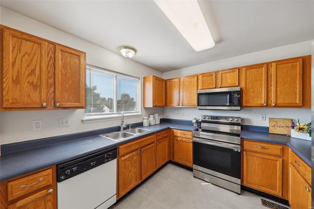 kitchen featuring appliances with stainless steel finishes and sink