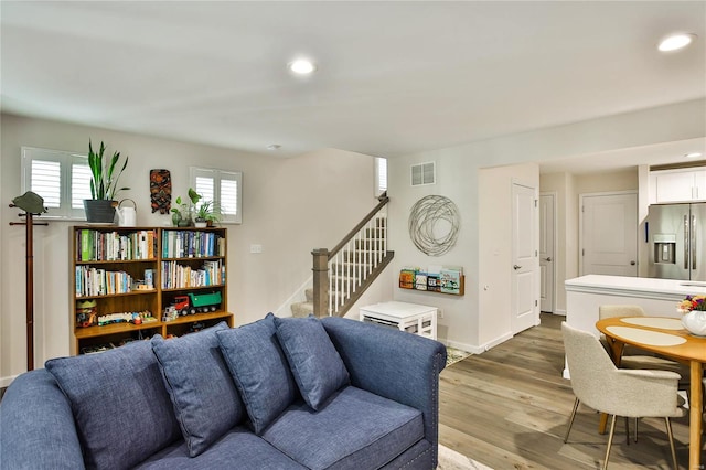 living room with hardwood / wood-style flooring