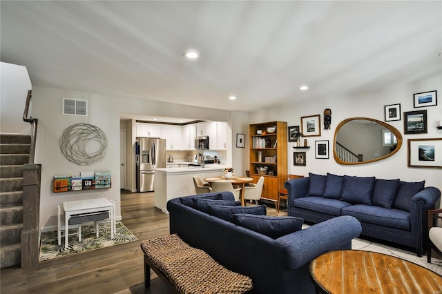 living room with hardwood / wood-style flooring