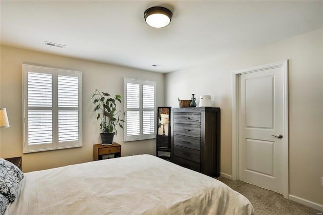 bedroom featuring carpet flooring