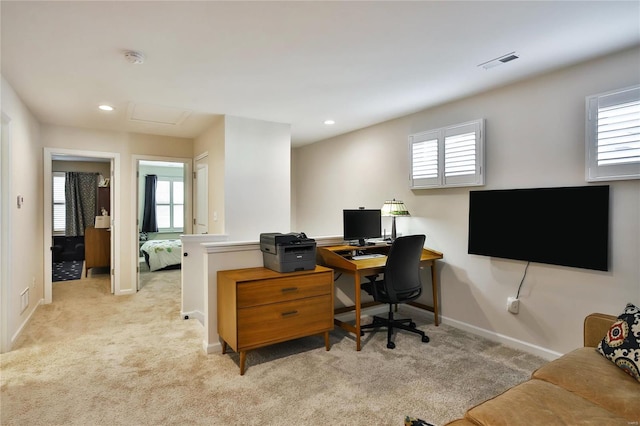 carpeted office featuring a wealth of natural light