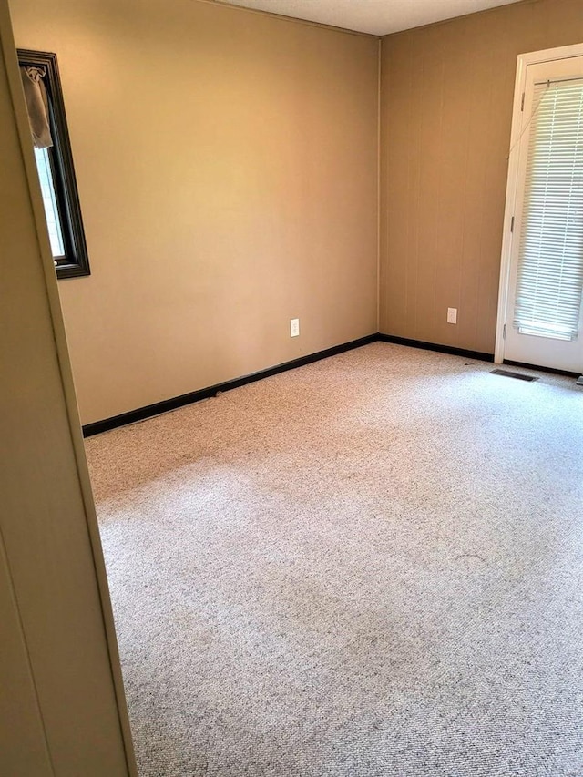 empty room featuring carpet