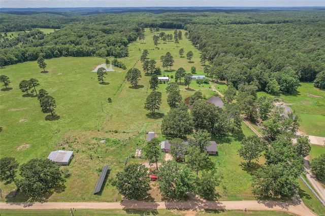 drone / aerial view with a view of trees