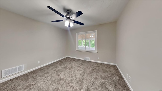 spare room with carpet flooring and ceiling fan