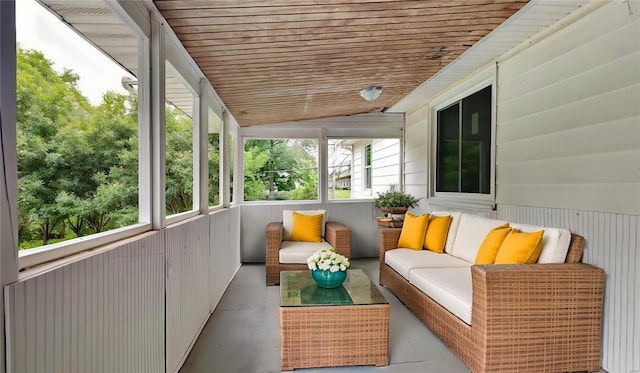 sunroom / solarium with wood ceiling and vaulted ceiling