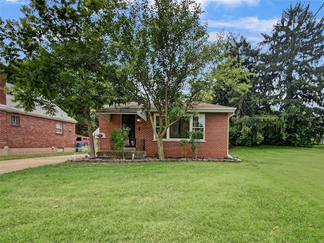 view of front of property with a front lawn