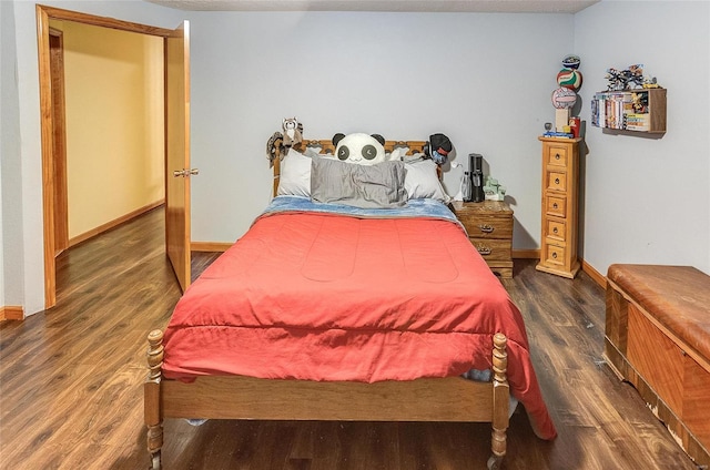 bedroom featuring dark hardwood / wood-style floors