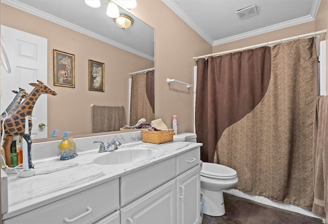 bathroom with vanity, crown molding, and toilet