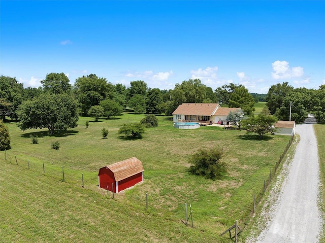 birds eye view of property featuring a rural view