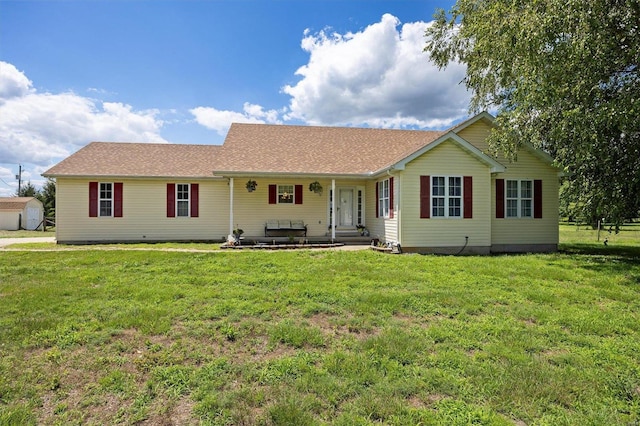 single story home with covered porch and a front lawn