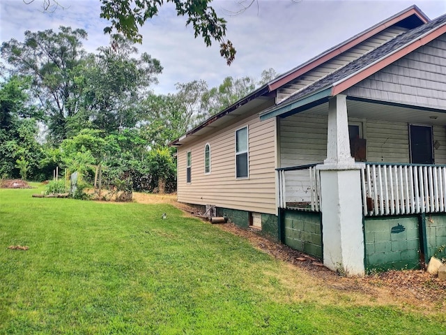 view of home's exterior featuring a lawn