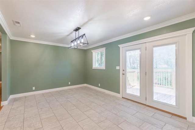 interior space with crown molding and a chandelier