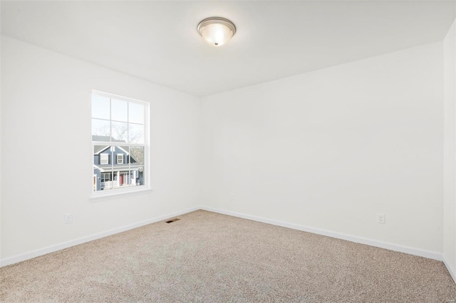 view of carpeted spare room