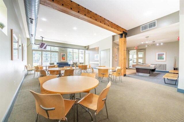 carpeted dining area featuring beam ceiling, french doors, and billiards