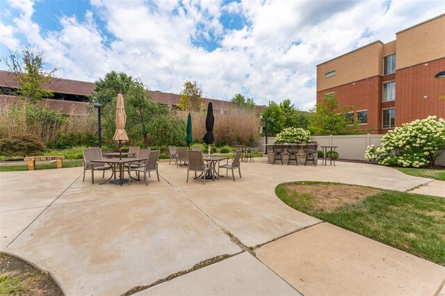 view of patio featuring exterior bar