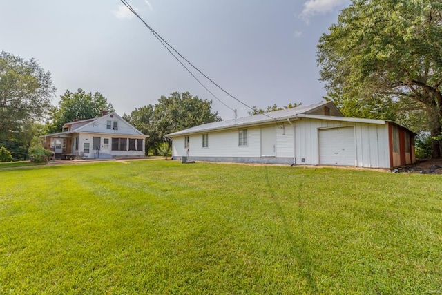 view of yard featuring a garage