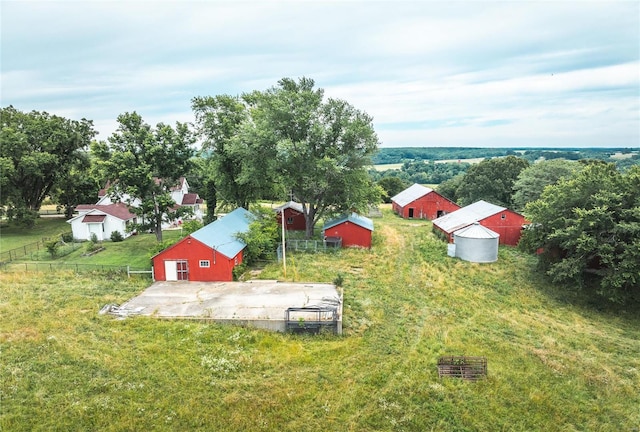 birds eye view of property featuring a rural view