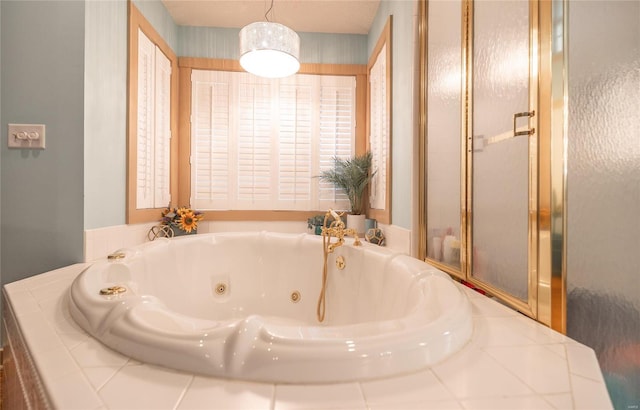 bathroom featuring a tub to relax in