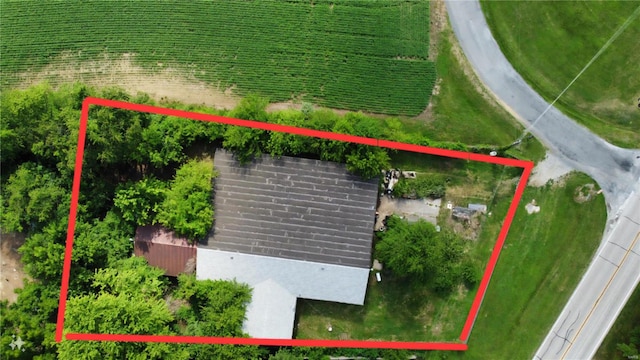 birds eye view of property with a rural view