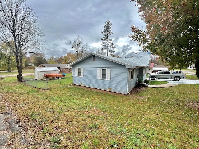 view of property exterior featuring a lawn